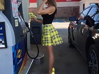 pumping gaz in mini skirt