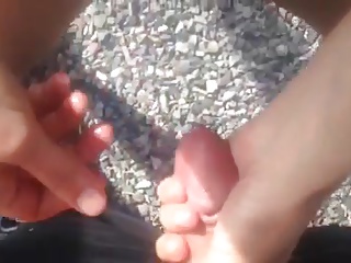 Bitck nude in park jerking and sucking